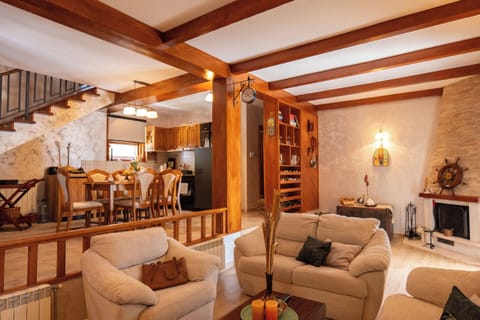 Living room opens to kitchen and dining area