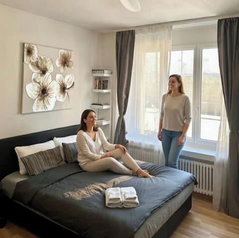Conveys comfort, cleanliness, and a welcoming, lived-in atmosphere rather than a formal hotel feel.