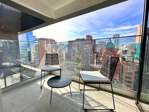 Enjoy breathtaking city and mountain views from your private balcony, perfect for morning coffee or evening relaxation.