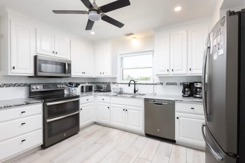 Bright White Kitchen w Stainless Steel Refrigerator, Microwave, Oven Range, Dishwasher, Sink, Cooking Utensils and Much More