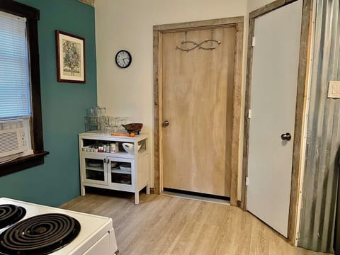 Back door lead to laundry area which is shared with the other units. 