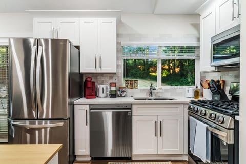 Fully equipped kitchen with windows