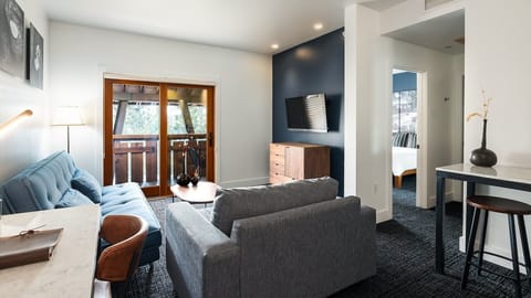 Unwind on the sofa and step onto the balcony.