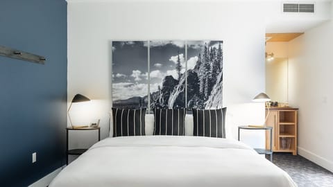 Sink into crisp linens and drift off in quiet comfort.