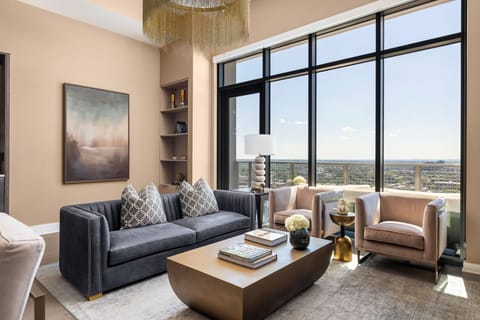 Living room featuring a 65" 4K UHD TV