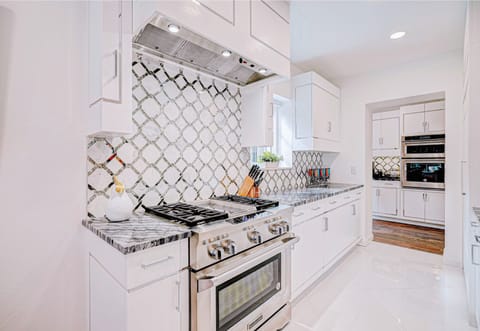 Modern appliances and sleek countertops create a chef-worthy kitchen in this rental.