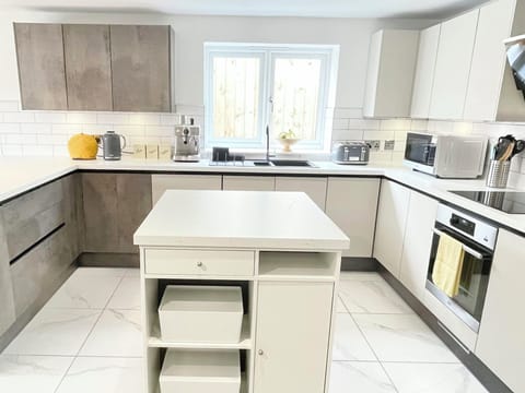 Kitchen; AEG Oven, Induction Hob and Glass Extractor, Large Inverter Microwave