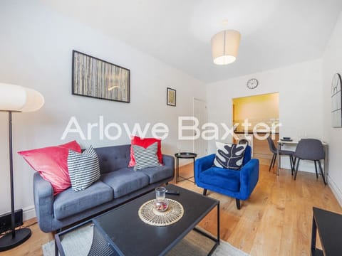 Bright and stylish living area with comfortable seating and a dining space—perfect for relaxing or socializing.