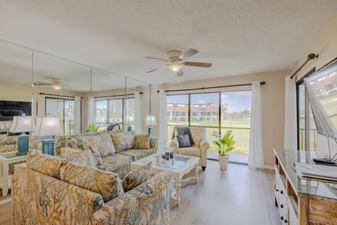 AIry and bright living room w smart TV!