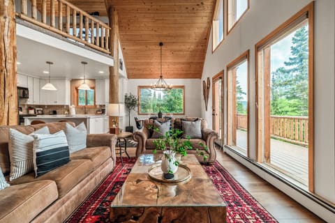 As you enter the home, you are greeted by the floor to ceiling windows of the Great Room