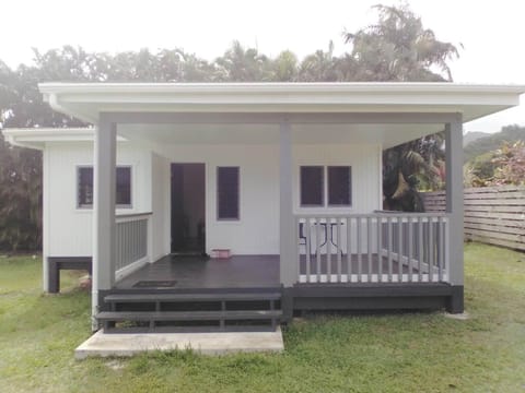 Exterior view of the house, gloomy day in paradise. 