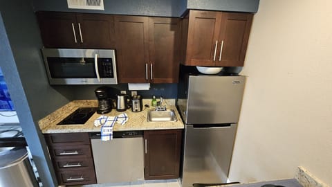 Fully stocked with the basics to whip up a home-style meal. Appliances: Coffee m