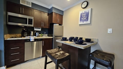 Bright and welcoming table for four—perfect for meals or game nights.