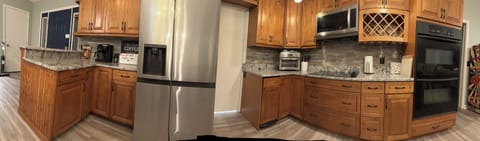 Kitchen Fully Stocked Panoramic Picture