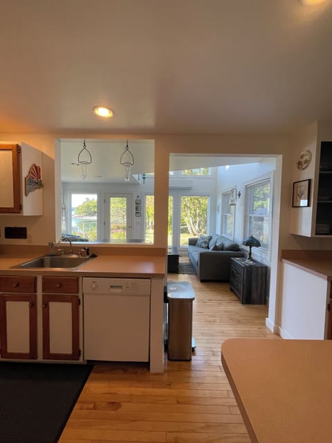 Kitchen overlooking living & dining space