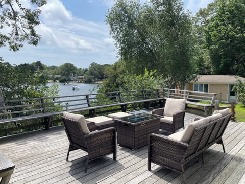 Relax on your expansive deck on Lake Wequaquet