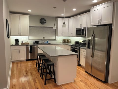 Gorgeous, spacious chef's kitchen with large kitchen island