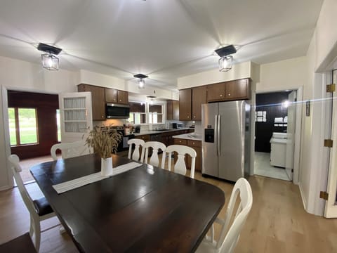 Dining Room/Kitchen/downstairs full Bathroom view.
