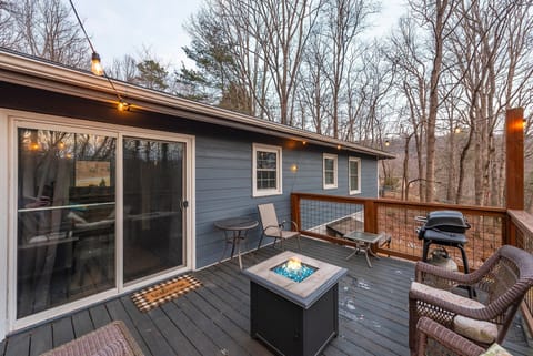 Relax on the deck around the fire table or use the gas grill to make summer favorites like burgers and grilled veggies.