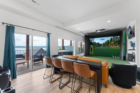 Host your own mini tournament with the in-home golf simulator—fun competition any time, rain or shine.