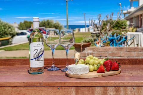 Sip, relax, and take in the stunning sea views