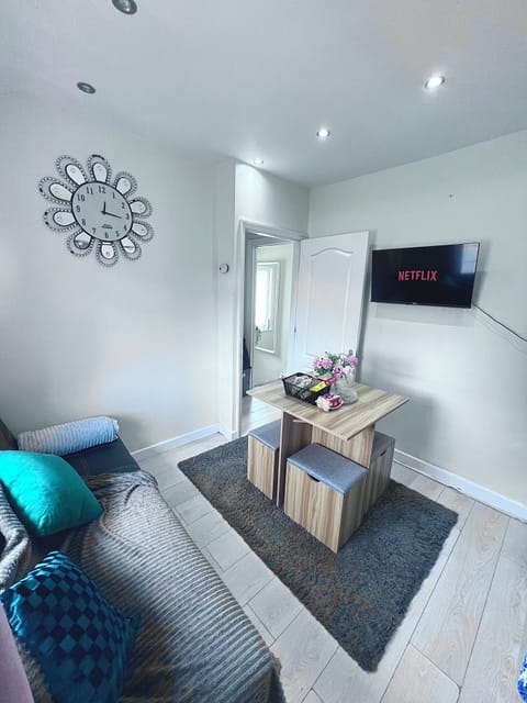 Open plan seating area and kitchenette