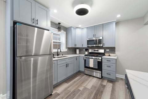 Sleek appliances and practical counter space make this kitchen easy to enjoy.