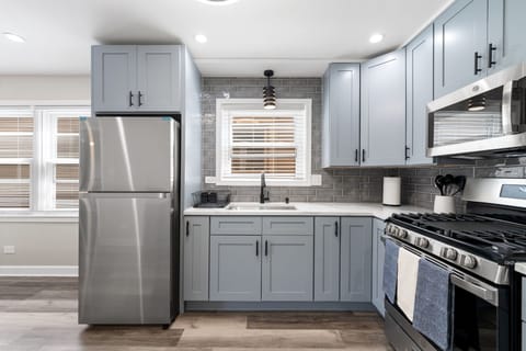 A bright kitchen setup designed for both quick bites and shared meals.