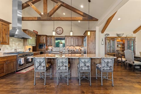 This inviting kitchen features a large island, ideal for meal prep and entertaining.