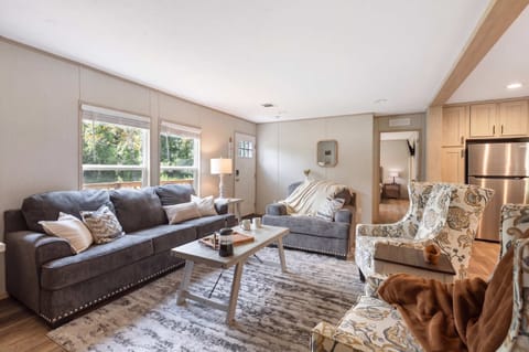 Sink into comfort in our bright, open-concept living area. Whether you're enjoying your morning coffee by the window or curling up for a movie night, this space is designed for total relaxation.