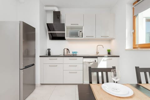 Kitchenette with a microwave.