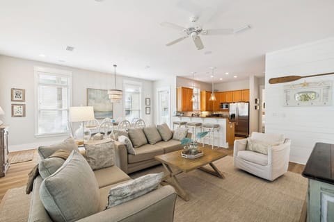 Relax in your bright, open living space with plush seating and a fully equipped kitchen perfect for gathering.