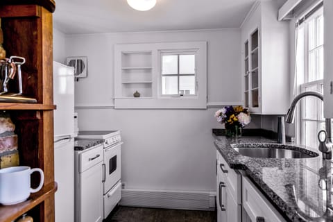 This kitchen is both elegant and functional, with high-end finishes.