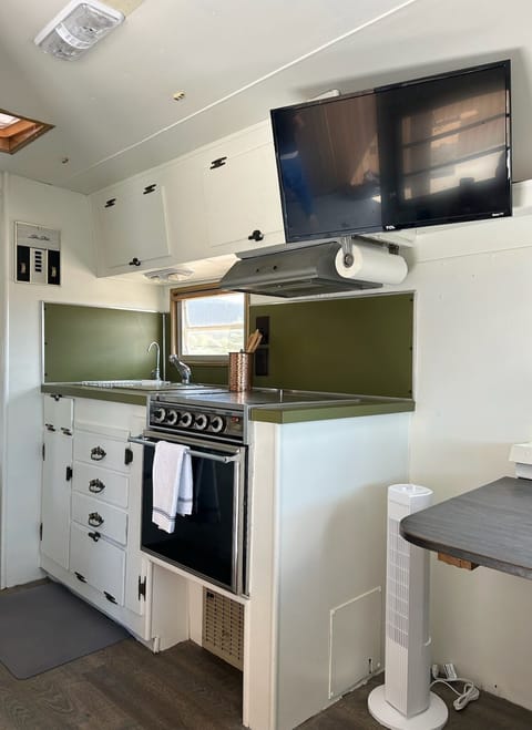 Charming and functional kitchen space.