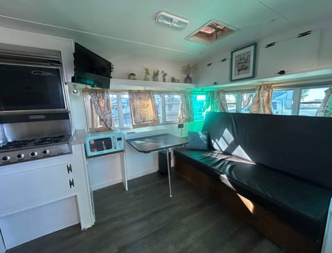 Welcome to the Living Room! The couch is comfy, and the table fits perfectly.