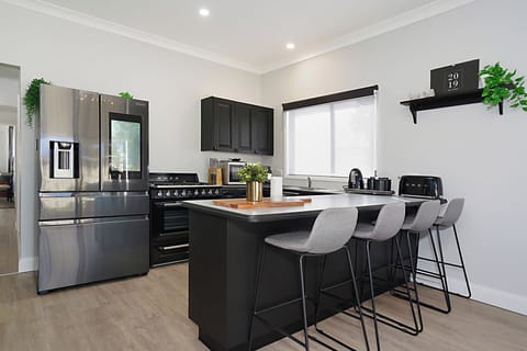 Main kitchen, 900 smeg gas top cooking and Samsung family hub fridge