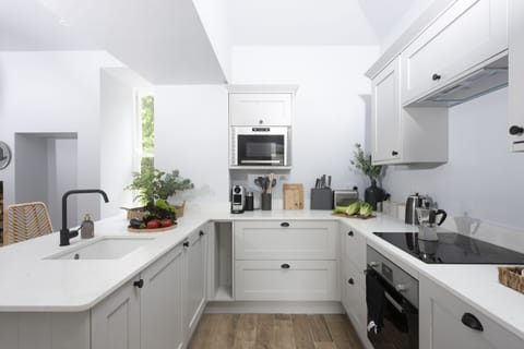 The kitchen with decorative plants - The Elms