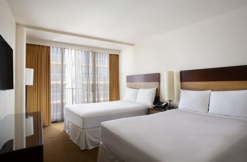 Spread out comfortably with two beds and calming coastal light.