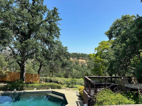 Private backyard and patio overlooking the Hinkle Creek Nature Area