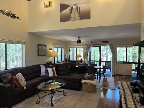 Living room looking towards dining  area and back deck