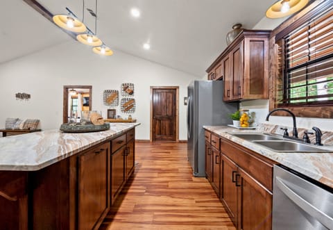 The kitchen is the heart of our cabin, offering a welcoming space for cooking and gathering.