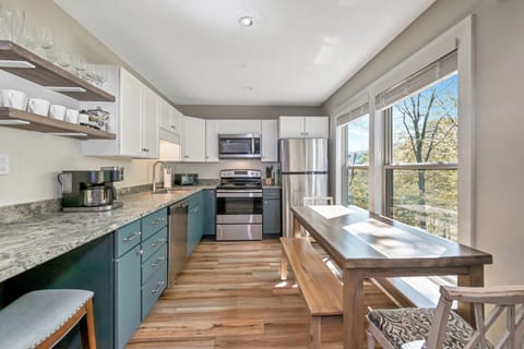 Gather around for a home cooked meal made in the fully equipped kitchen.