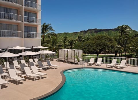 Recline poolside and enjoy a calm, sunlit afternoon.