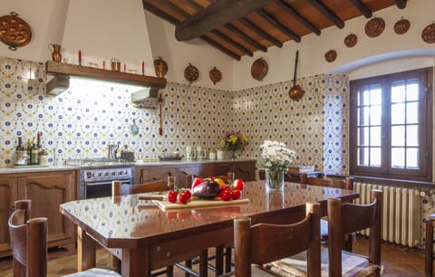 Table, Furniture, Property, Cabinetry, Countertop, Window, Wood, Interior Design, Lighting, Chair