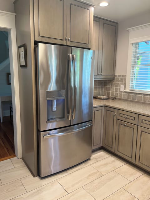 Kitchen has upscale appliances… including a wine cooler
