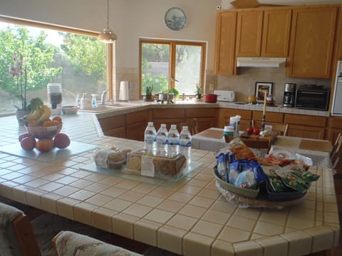 Walking up to the kitchen after coming home.  On the left is the refrigerator.