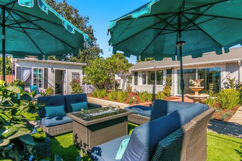 Spend peaceful mornings with the hummingbirds & butterflies in this idyllic yard