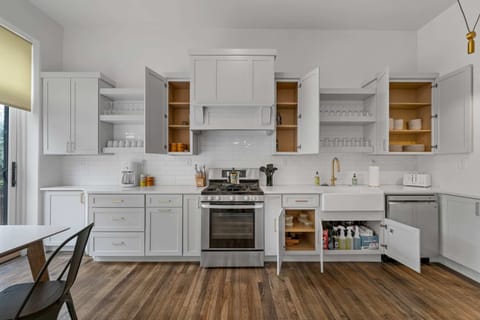 Cabinet doors open, showing off all the neat and tidy goodies! Let’s get cooking!