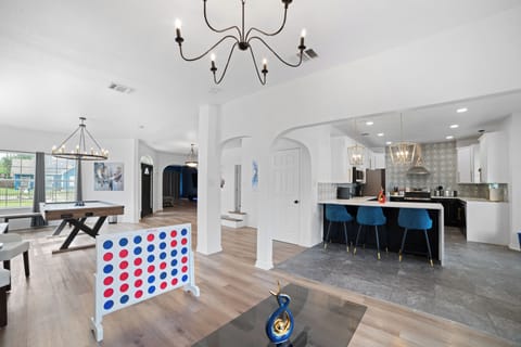 Family Room with 85 Inch TV and Pulldown Mount