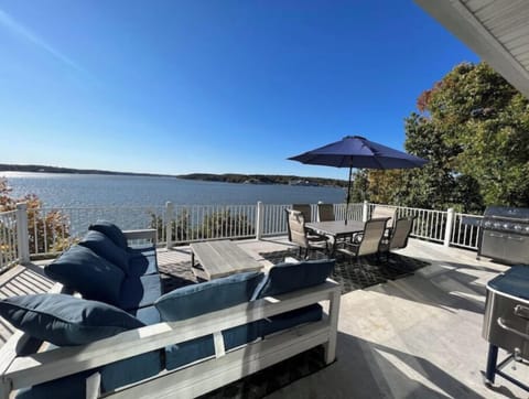 Enjoy the lake while sitting outside on the deck.